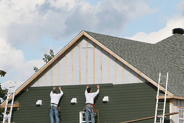 Professional Storm Damage Siding Repair technician working in Round Hill, VA